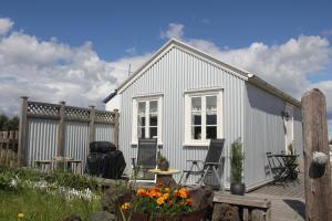 Foto da galeria de Sea Side Cottages em Eyrarbakki