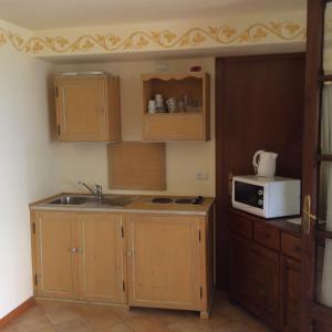 Køkken eller tekøkken på Appartamenti Cavriè + 97 billeder