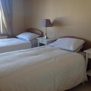 A bed or beds in a room at St. Catherines