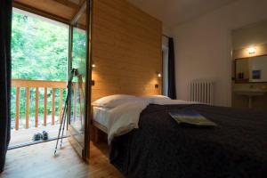 Postel nebo postele na pokoji v ubytování B&B Il Bucaneve