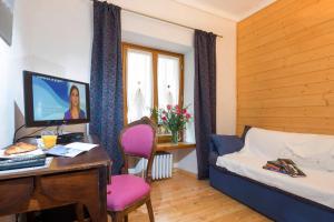 TV a/nebo společenská místnost v ubytování B&B Il Bucaneve