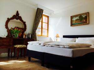 Säng eller sängar i ett rum på Hotel Viktoria