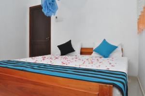 Postel nebo postele na pokoji v ubytování TMS Beach House