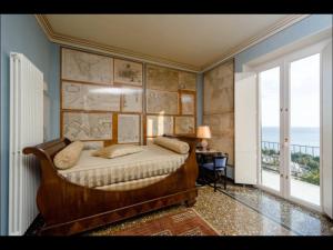 Katil atau katil-katil dalam bilik di La Casa Del Viaggiatore Luxury