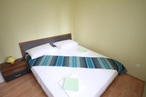 Кровать или кровати в номере Apartment Franusic