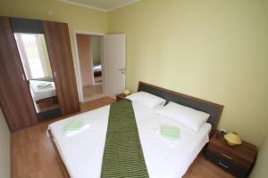 Кровать или кровати в номере Apartment Franusic
