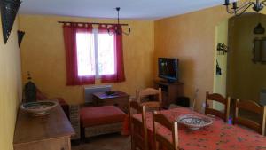 TV a/nebo společenská místnost v ubytování L'Ispanina