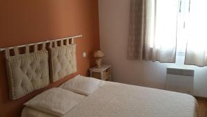 Postel nebo postele na pokoji v ubytování L'Ispanina + 12 fotografií