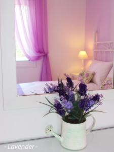 A bed or beds in a room at Villa Kiza Apartments