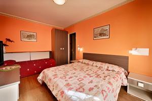 Postel nebo postele na pokoji v ubytování Albergo Mancuso del Voison