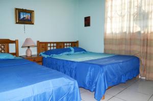 Ένα ή περισσότερα κρεβάτια σε δωμάτιο στο Finca Sol y Luna +35 φωτογραφίες