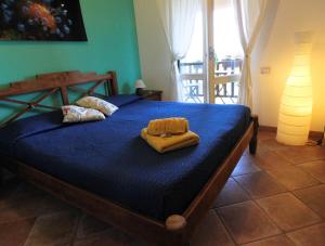 Postel nebo postele na pokoji v ubytování B&B MrCaruba