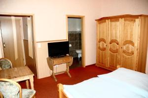 TV a/nebo společenská místnost v ubytování Hotel Kappelner Hof