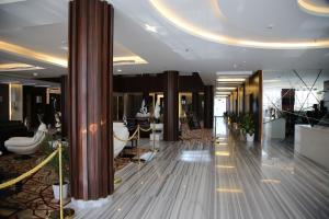 The lobby or reception area at Raoum Inn Khafji Corniche