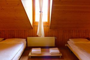 Letto o letti in una camera di Hôtel - Petit-déjeuner Le Trift