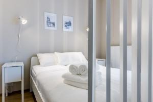 Posteľ alebo postele v izbe v ubytovaní Okrzei 18 - studio by Homeprime