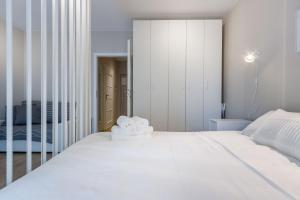 Posteľ alebo postele v izbe v ubytovaní Okrzei 18 - studio by Homeprime