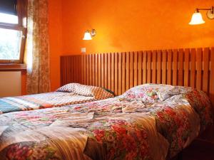 Ένα ή περισσότερα κρεβάτια σε δωμάτιο στο Villa Casagrande