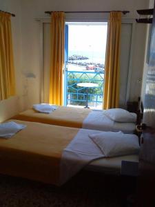 Katil atau katil-katil dalam bilik di Kythereia Hotel