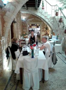 Reštaurácia alebo iné gastronomické zariadenie v ubytovaní Veneto Boutique Hotel