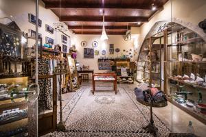 a store with a room filled with lots of items at Veneto Boutique Hotel in Rethymno Town