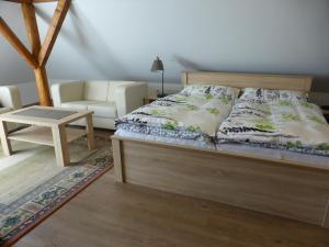 Postel nebo postele na pokoji v ubytování Tündérgyöngye Apartmanház
