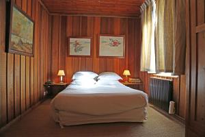 Postel nebo postele na pokoji v ubytování La Maison du Bassin