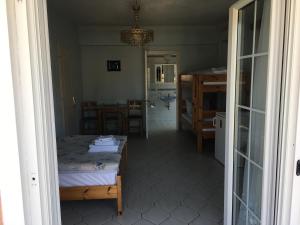 A bed or beds in a room at Villa Elena
