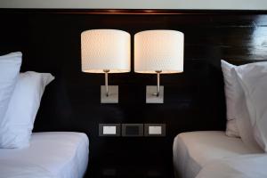 Postel nebo postele na pokoji v ubytování SakSukSmile Resort