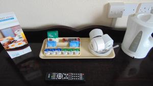 a tray of food on a table next to a blender at The Harrowgate Hill Lodge in Darlington