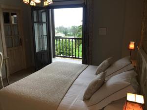 Cama o camas de una habitación en El Rincón de Escalante