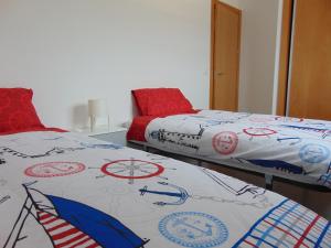 two beds sitting next to each other in a room at Hydra Ground 1D in Puerto de Mazarrón