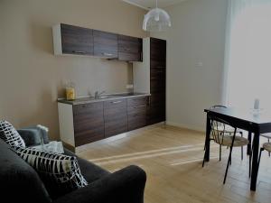 A kitchen or kitchenette at Appartamenti Emilio