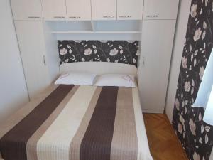 Posteľ alebo postele v izbe v ubytovaní Petar Apartments