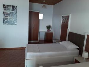 Voodi või voodid majutusasutuse Hotel Riviera toas