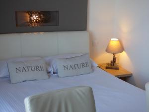 Posteľ alebo postele v izbe v ubytovaní Rive Gauche