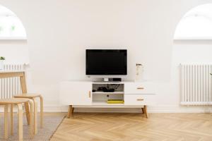TV a/nebo společenská místnost v ubytování Vana-Posti Apartment