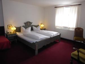 Postel nebo postele na pokoji v ubytování Hotel Haus Appelberg