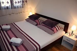 Postel nebo postele na pokoji v ubytování Apartment Ana
