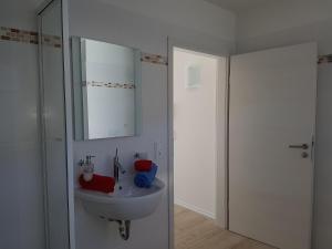 Koupelna v ubytování Hafenzauber + 37 fotografií