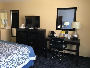 Letto o letti in una camera di Days Inn by Wyndham Moab