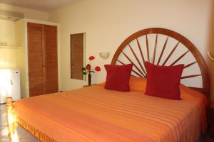 Posteľ alebo postele v izbe v ubytovaní Tamarind Tree Hotel
