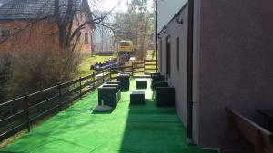 Vonkajšia záhrada v ubytovaní Guest House Wolf