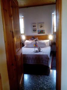 Posteľ alebo postele v izbe v ubytovaní Nightingale Cottage Pelion
