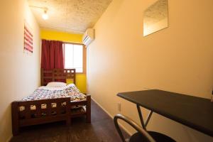 En eller flere senger på et rom på Hostel Q