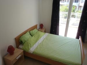 Postel nebo postele na pokoji v ubytování Appartement Les Alizés