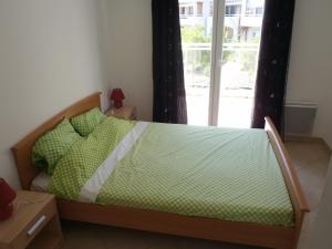 Postel nebo postele na pokoji v ubytování Appartement Les Alizés