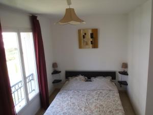 Postel nebo postele na pokoji v ubytování Appartement Les Alizés
