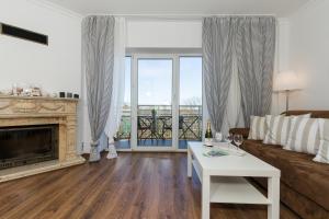 Posteľ alebo postele v izbe v ubytovaní Jantar Apartamenty - Penthouse Sea View Morska