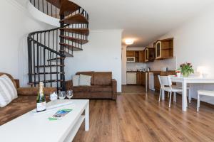 Kuchyňa alebo kuchynka v ubytovaní Jantar Apartamenty - Penthouse Sea View Morska